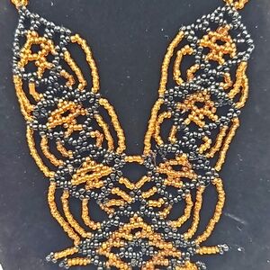 Hand beaded necklace in black and brown